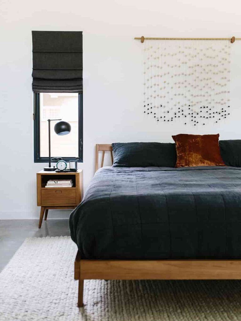 a DIY wall art above bedroom headboard