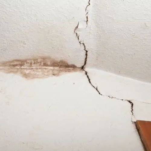 a picture showing discolored and damaged ceiling cracks