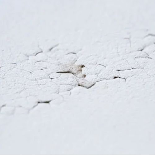 a picture showing crawler ceiling cracks